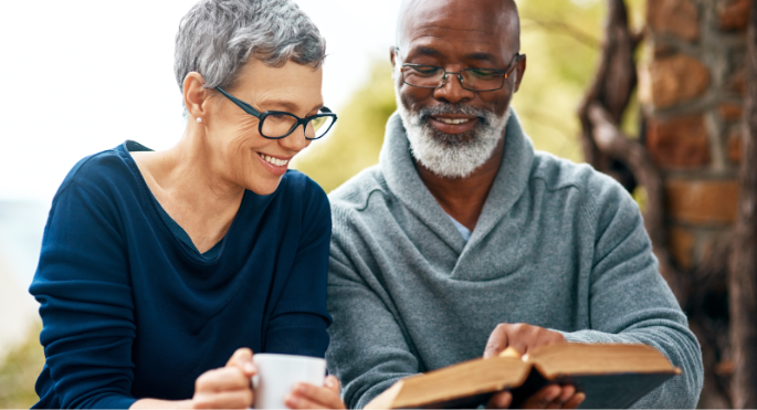 Seniors going to meet with an insurance agent to discuss Medicare enrollment options, including Part A, B, C, and D coverage.